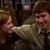  Jim brags on Pam, then puts his arm around her when the bartender hits on her